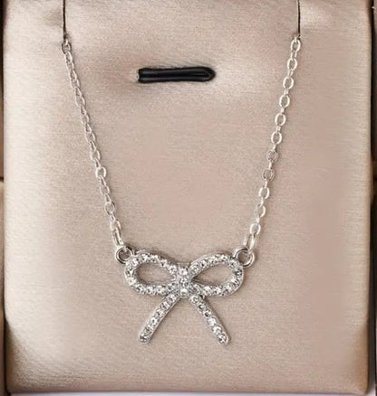 Silvery Bow Pendant Necklace