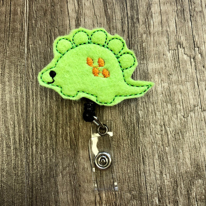 Dino Badge Reel