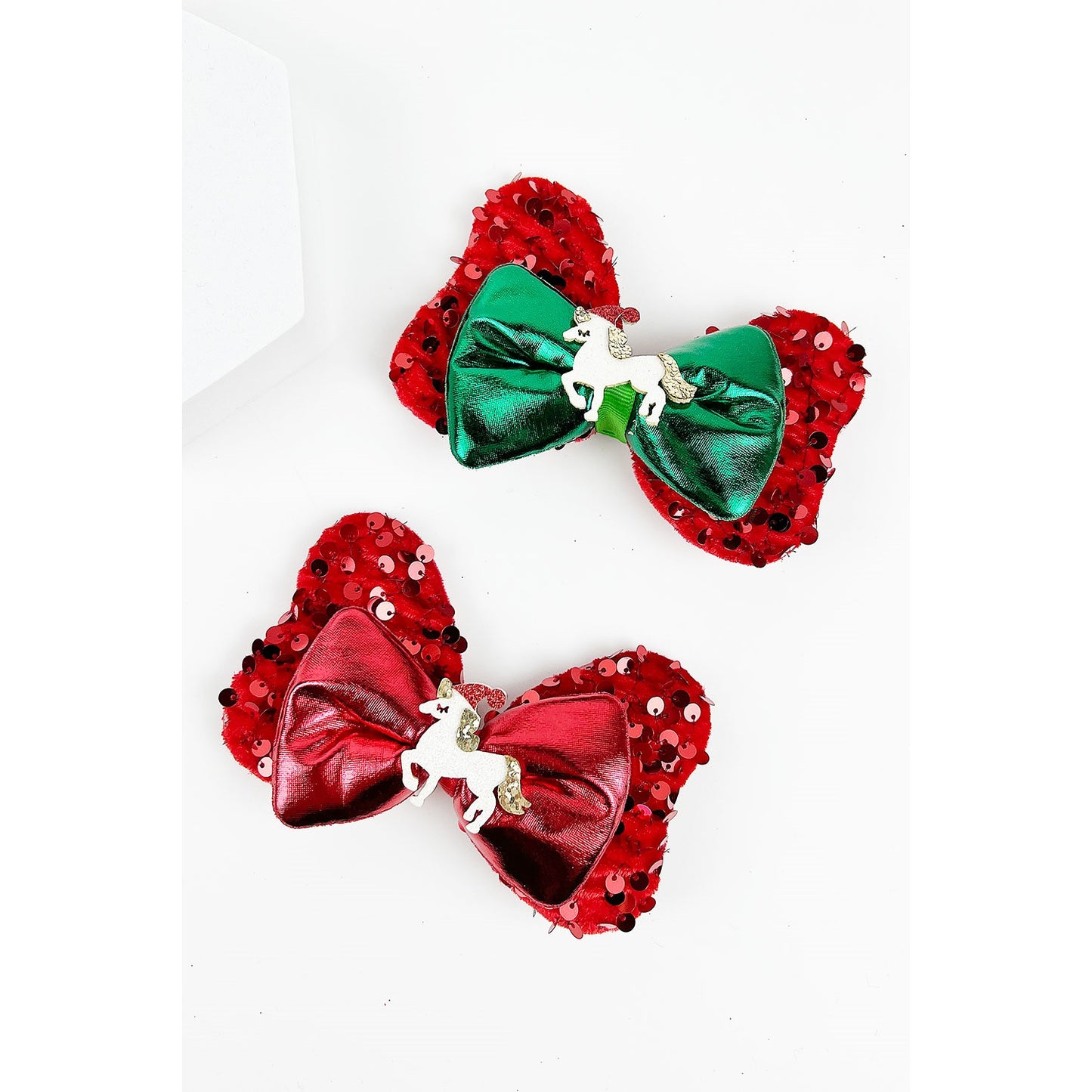 CHRISTMAS UNICORN SEQUIN BOW CLIP